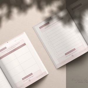 Puede incluir: Dos p&aacute;ginas abiertas de un diario rosa y blanco con p&aacute;ginas rayadas y secciones para "Challenge Set #1", "Afirmaciones diarias" y "Apreciaci&oacute;n diaria".