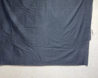 Trozo de tela. Quizás una tela para pantalones.