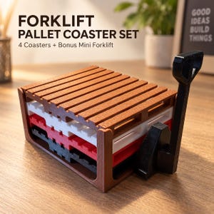 May include: A set of four square coasters designed to look like shipping pallets in brown, white, red, and black, stacked together. A black plastic mini forklift accessory is attached to the side. The text reads FORKLIFT PALLET COASTER SET.