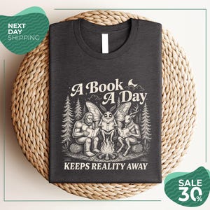 Cryptid Book Club Shirt | Bigfoot Mothman Reading Tee | Funny Book Lover Shirt | Campfire Reader Graphic T Shirt | Comfort Colors Tee