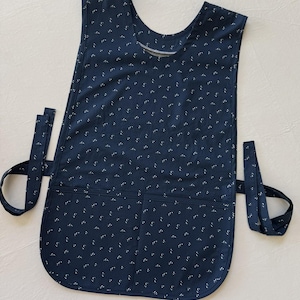 May include: A handmade wooden sign with the text "Welcome to our home" in a handwritten style. The sign is painted white with a distressed finish and a dark brown border. It is designed for indoor or outdoor use.