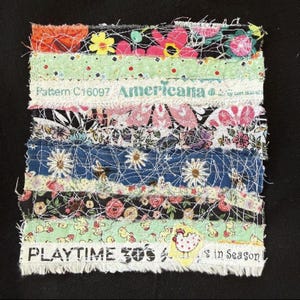 May include: A patchwork textile with layered fabric strips in various floral and patterned designs. The text "Americana" and "Playtime 30's" are visible. White thread stitches the strips together, creating a textured, handcrafted appearance.