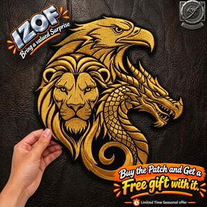 Puede incluir: Un parche bordado dorado con una cabeza de león, una cabeza de águila y una cabeza de dragón. El diseño está realizado en hilo dorado metálico sobre fondo negro. El texto IZOF Bring a valued Surprise y Buy the Patch and Get a Free gift with it.