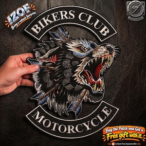 May include: A large embroidered patch featuring a snarling wolf head with arrows piercing its neck, set against a black background. The design includes two curved black banners with white text reading BIKERS CLUB and MOTORCYCLE.