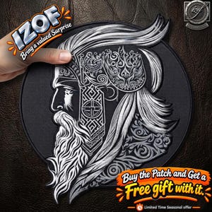 May include: A circular black embroidered patch featuring a detailed silver-toned profile of a bearded figure with long flowing hair and intricate ornamental headgear. The design includes geometric patterns and scrollwork, with the text IZOF visible.