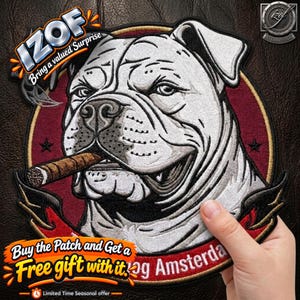 May include: A circular embroidered patch featuring a white bulldog with a cigar in its mouth, set against a dark red background with black stars. The patch includes the text IZOF Bring a valued Surprise and Amsterdam in white lettering.
