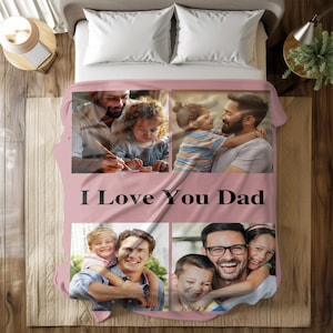 May include: Pink fleece blanket with four family photos and the text "I Love You Dad" in black. The photos show a father with his children. A cosy and sentimental gift for Father's Day or any special occasion.