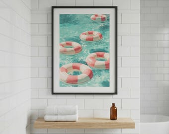 Arte de parede para banheiro com boias de piscina rosa – Impressão de boia de verão