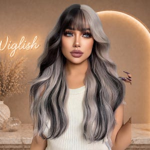 May include: A woman with long, wavy hair in black and silver tones, styled with bangs. The hair is parted down the middle. The image includes the word "Wiglish" in a neon sign. The woman is wearing a white top.