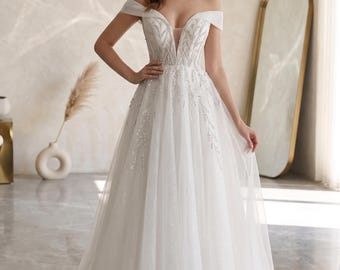 Robe de mariée bohème à épaules dénudées personnalisable, robe de mariée trapèze ornée de perles, robe de mariée bohème pour la plage