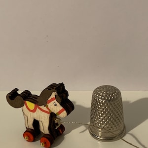Dolls house 1/12th scale pull along saddled  pony toy