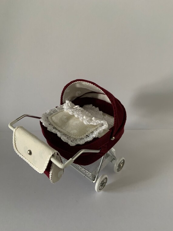 burgundy pram
