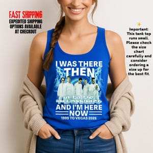 May include: A royal blue tank top with the text "I WAS THERE THEN AND I'M HERE NOW" and a graphic of a musical group. The text "1999 TO VEGAS 2026" is also printed on the tank top.