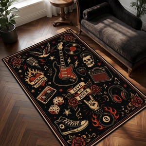 May include: A rectangular area rug with a black background featuring a rock and roll theme. The design includes a guitar, skull, cassette tape, dice, headphones, an amplifier, a sneaker, roses, and a hand gesture with the text "LIVE TO ROCK".