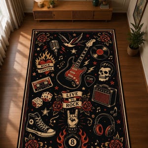 May include: A rectangular area rug with a black background featuring rock and roll themed illustrations including a red electric guitar, a skull, a cassette tape, dice, a sneaker, headphones, an amplifier, roses, and the text "LIVE TO ROCK".