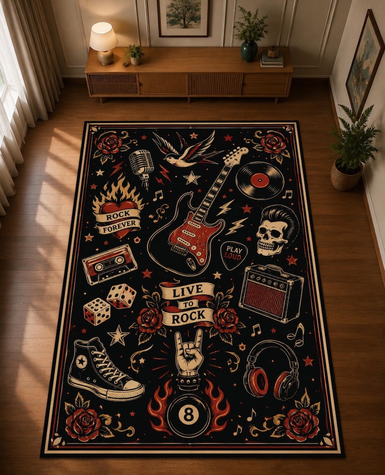 May include: A rectangular area rug with a black background featuring rock and roll themed illustrations including a red electric guitar, a skull, a cassette tape, dice, a sneaker, headphones, an amplifier, roses, and the text "LIVE TO ROCK".