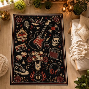 May include: A rectangular area rug featuring a black background with a rock and roll theme. The design includes a red electric guitar, a skull, a cassette tape, a microphone, a vinyl record, a high-top sneaker, headphones, dice, and roses.