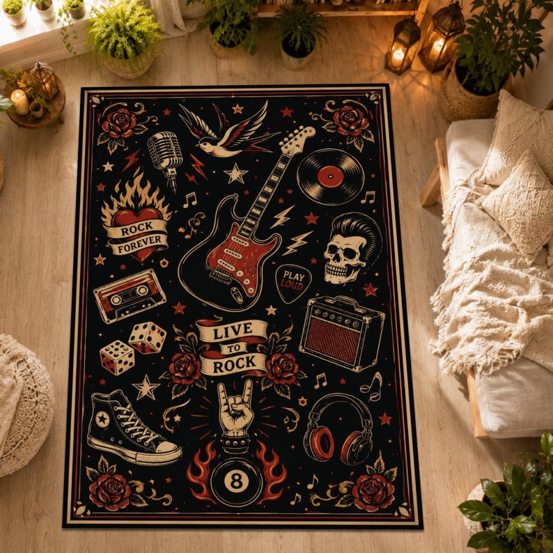 May include: A rectangular area rug featuring a black background with a rock and roll theme. The design includes a red electric guitar, a skull, a cassette tape, a microphone, a vinyl record, a high-top sneaker, headphones, dice, and roses.