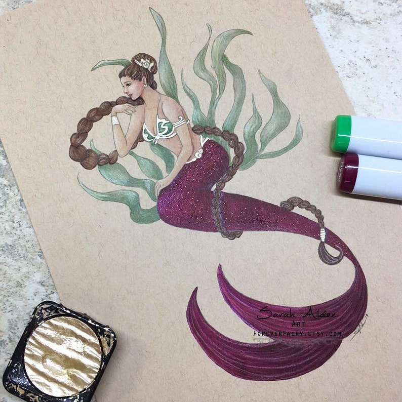 May include: A hand-drawn illustration of a mermaid with a purple tail and brown hair. The mermaid is wearing a green and white bikini top. The illustration is on a brown paper background.