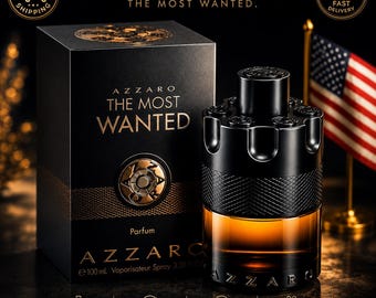 May include: A black and gold perfume bottle and box set. The box reads "AZZARO THE MOST WANTED" with the text "BOLD. CONFIDENT. UNSTOPPABLE. THE MOST WANTED." The bottle is black with a gold-colored liquid inside. The American flag is in the background.