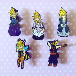 May include: Set of five enamel pins featuring different characters with yellow hair. The characters are wearing various outfits, including a purple dress, a pink dress, a bee costume, a black and white dress, and a black and brown outfit.