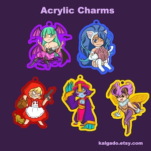 May include: Acrylic charms featuring colorful cartoon characters. The charms include a female vampire with green hair, a cat-eared girl with blue hair, Little Red Riding Hood with a gun, a purple-robed character, and a bee-themed character. The text "Acrylic Charms" is at the top.