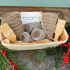 Heirloom vegetable seeds in a gift basket. includes growing supplies and instructions