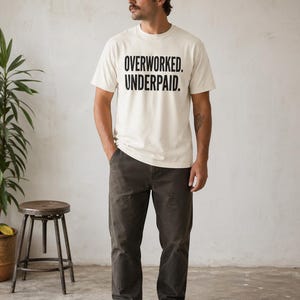 Overworked Underpaid Typographic Statement Tee | Sarcastic Work Humor Shirt image 1