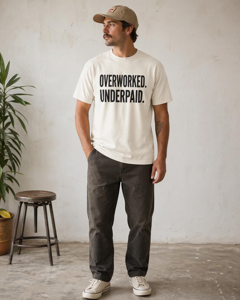 Overworked Underpaid Typographic Statement Tee | Sarcastic Work Humor Shirt image 1