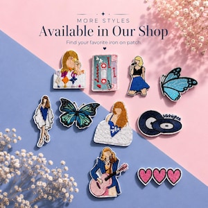 May include: A collection of embroidered iron-on patches featuring various designs including a cassette tape, a blue butterfly, a person playing a guitar, a person in a blue skirt, a person in a white coat, and three pink hearts with the text Midnights.