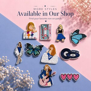 May include: A collection of embroidered iron-on patches featuring various designs including a cassette tape, a blue butterfly, a person playing a guitar, a person in a blue skirt, a person in a white coat, and three pink hearts with the text Midnights.