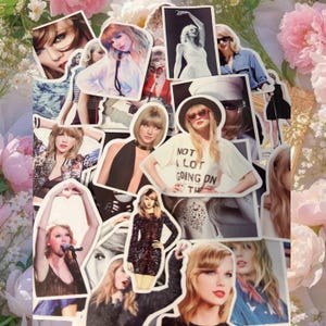 May include: A collection of die-cut stickers featuring various photographic portraits and performance images of Taylor Swift. The stickers display diverse outfits, hairstyles, and poses, including one sticker with the text NOT A LOT GOING ON AT THE MOMENT.