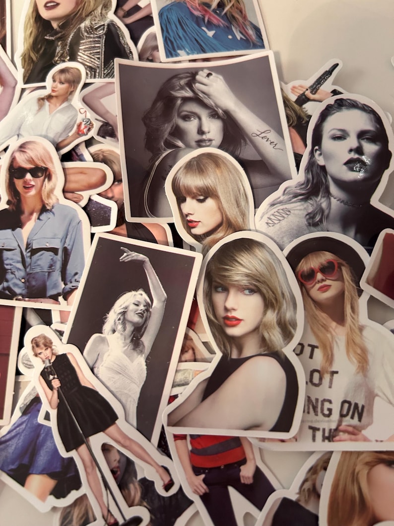 May include: A collection of die-cut stickers featuring various photographic portraits and performance images of Taylor Swift. The stickers display diverse outfits, hairstyles, and poses, including one with the text Lover and another with text reading NOT NOT ING ON THE.