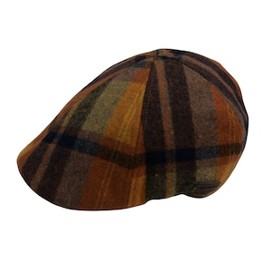 May include: A brown, orange, and navy plaid flat cap. The cap has a classic design with a rounded crown and a short, stiff brim. The plaid pattern features vertical and horizontal lines in various shades of brown, orange, and navy.