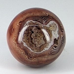 Sardonyx Sphere Banded Agate Root Chakra Brown Black Swirls Design Strength Protection Patterning WHO22e89