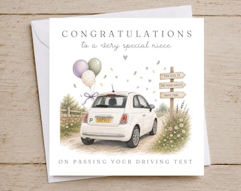 May include: A square greeting card featuring a white car with a yellow license plate reading SOPHIE and a green P plate. Text reads CONGRATULATIONS to a very special niece ON PASSING YOUR DRIVING TEST. A wooden signpost reads YOU DID IT, THE ROAD AWAITS, HAVE FUN.