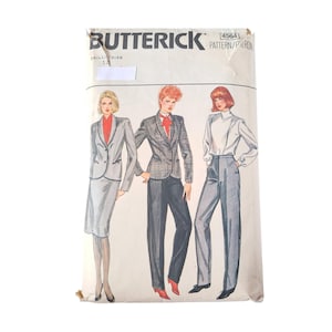 May include: Vintage Butterick sewing pattern featuring illustrations of women's suits and separates. The pattern packet shows a gray skirt suit, a plaid blazer with black pants, and a white blouse with gray trousers. The pattern number is 4564.