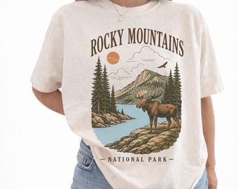 ロッキー山脈国立公園のムースをモチーフにしたグラフィックTシャツ、レトロな自然と荒野をイメージしたシャツ