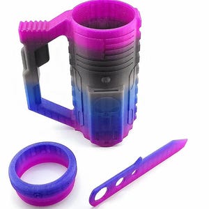 May include: A 3D-printed mug, ring, and knife set. The mug has a handle and a cylindrical body with a gradient of colors, transitioning from purple to blue. The ring and knife share the same color scheme. The set is designed with a futuristic aesthetic.