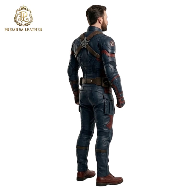 May include: A full-body leather costume featuring a dark blue jacket with red accents, a brown utility belt, and matching dark blue trousers. The jacket displays an Avengers logo on the shoulder and a metallic harness piece on the back. Brown boots.
