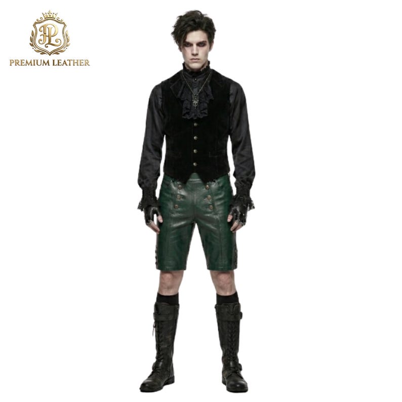 May include: A black long-sleeved shirt with a ruffled collar, a black button-up vest, and dark green leather shorts featuring double rows of buttons. The outfit includes black fingerless gloves and tall black boots with laces and buckles.