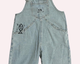 Mono infantil y de bebé con estampado en linóleo hecho a mano.