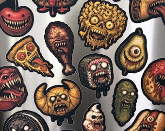 Ímãs de geladeira de terror com comidas monstruosas