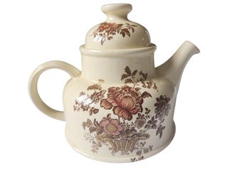 Tetera Charlotte Royal Crownford Staffordshire Inglaterra, color marrón con estampado floral.