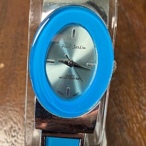 1990s Paul Jardin Cuff Watch Blue Oval Bezel Silver Sunburst Dial Hinged Bangle Fits up to 7.5 Inch Wrist Working