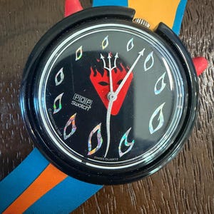 1995 Pop Swatch Hot Stuff PMB103, Black Devil Dial, Holographic Flames, Red Trident Hands, Leather Tail Strap, Working (Halloween)