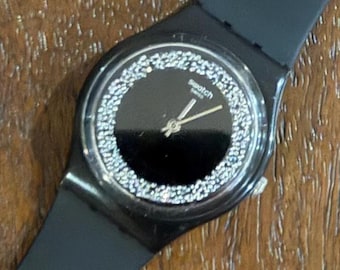 Swatch SparkleNight GB312 Originals Gent 34mm | Think Fun Collection | Black Case, Swarovski Crystal Dial Ring, Silver Hands