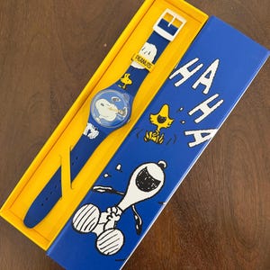 Swatch x Peanuts Snoopy Hee Watch (SO29Z106) – Bio-sourced Case, Silicone Strap