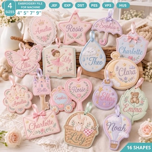 May include: A collection of sixteen embroidered hanging ornaments in various shapes including a butterfly, star, umbrella, book, heart, and hot air balloon. Each piece features pastel colors, floral accents, and names like Amelia, Rosie, and Lily.