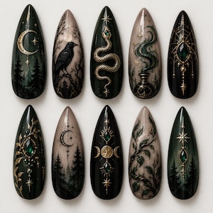 May include: A set of ten almond-shaped press-on nails featuring dark, intricate designs including a crescent moon, a raven, a coiled snake, a potion bottle, spider webs, emerald green gemstones, forest silhouettes, and gold star accents.